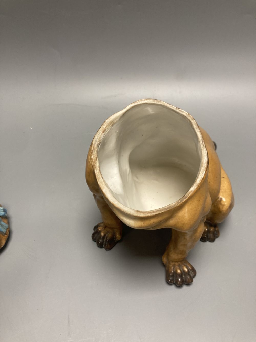A German porcelain pug tobacco jar and cover, late 19th century, height 18.5cm